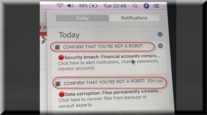 Screenshot of the CONFIRM THAT YOU'RE NOT A ROBOT pop up on Mac